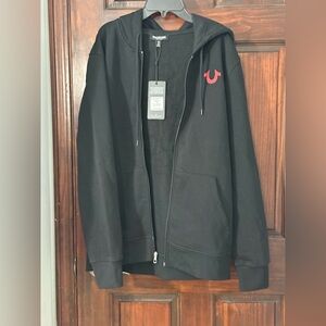 True Religion Buddha Logo Hoodie, featuring the brand's iconic logo $119